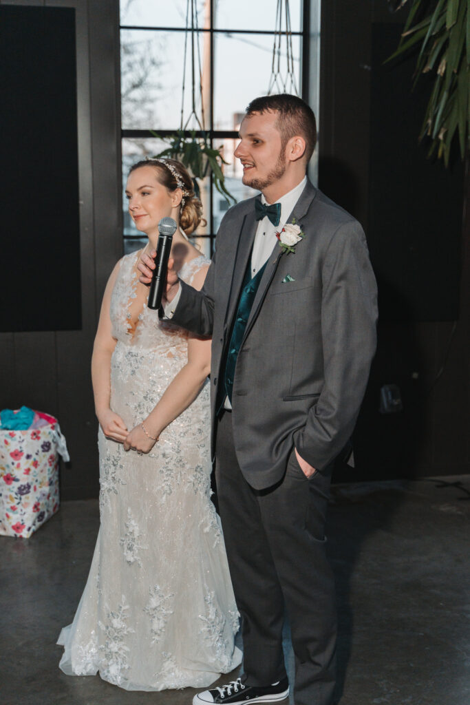 Logan & Jordan welcoming their guests to their wedding reception at Seventh Son Brewing Co in Columbus, OH