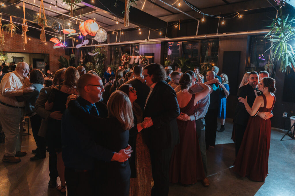 The anniversary dance at Jordan & Logan's Wedding Reception on the Rooftop at Seventh Son Brewing Co. in Columbus, OH