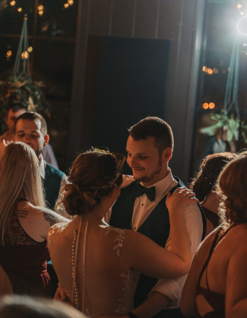 Jordan & Logan dancing among their guests on the Rooftop at Seventh Son Brewing Co in Italian Village in Columbus, OH