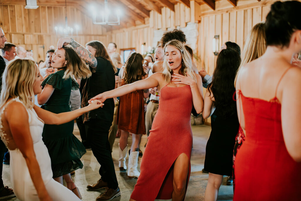 Ellen and her friends dancing and singing along at her wedding reception in Logan, Ohio