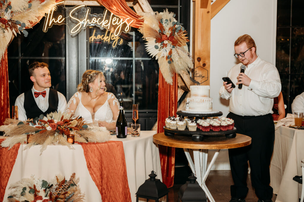 The brother of the Bride makes a speech during the wedding reception at Lavender Ridge Farm outside Newark, OH