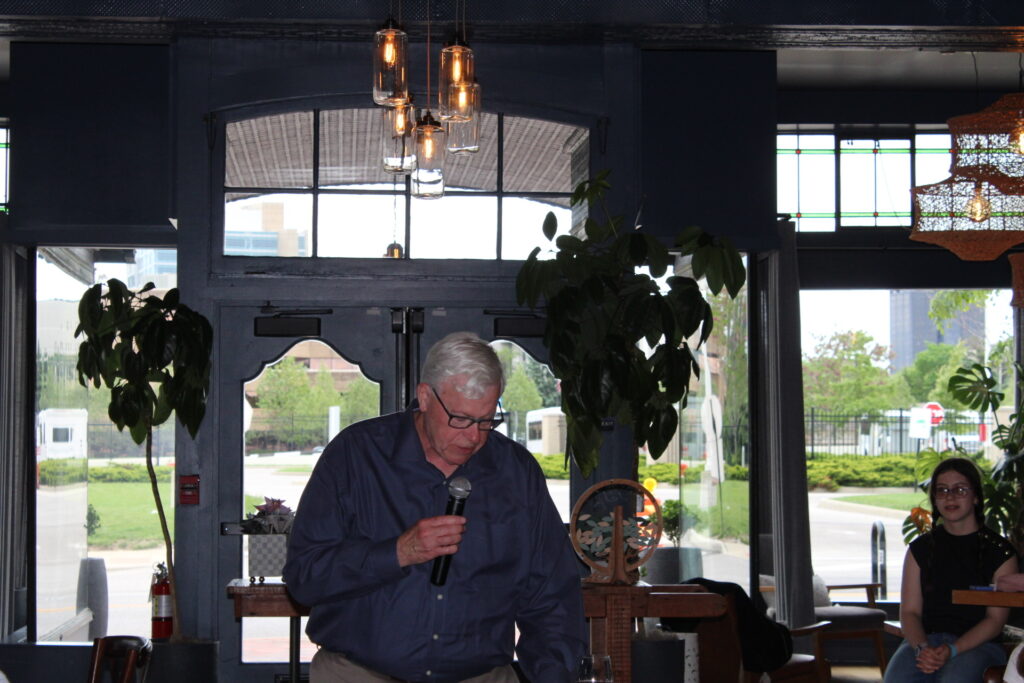 Isla's grandfather offering the Hamotzi before the meal at Isla's Bat Mitzvah in Columbus, OH