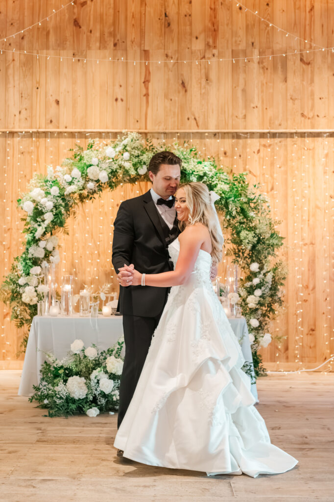 Anna & Codey share their first dance at their wedding reception inside The Historic Barn at Jorgensen Farms in Westerville, OH