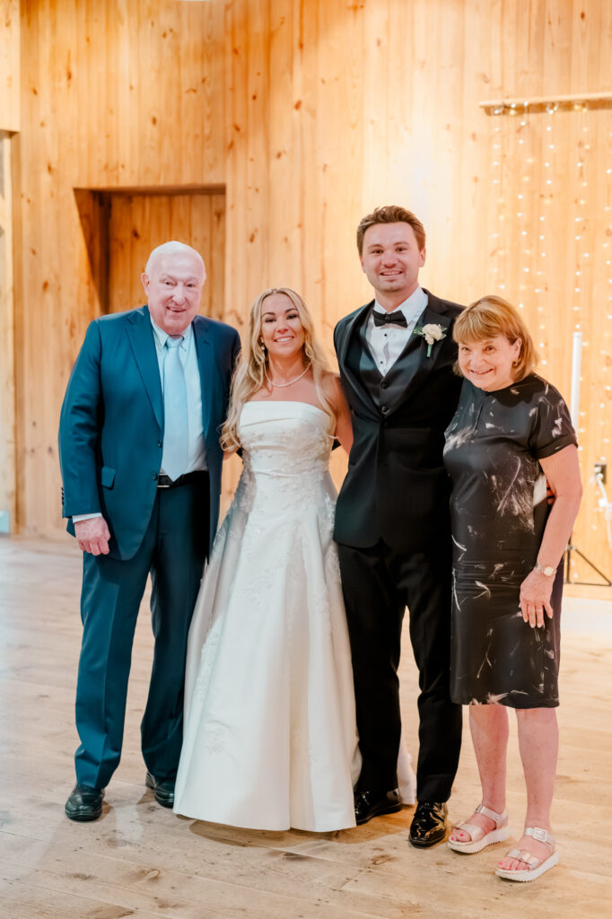 The couple married the longest from the Anniversary Dance standing beside Anna & Codey at their wedding reception inside the Historic Barn at Jorgensen Farms in Westerville, OH