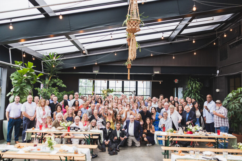 All of their friends and family gathered around Susan & Ryan on the dance floor at Seventh Son Brewing in Columbus, Ohio