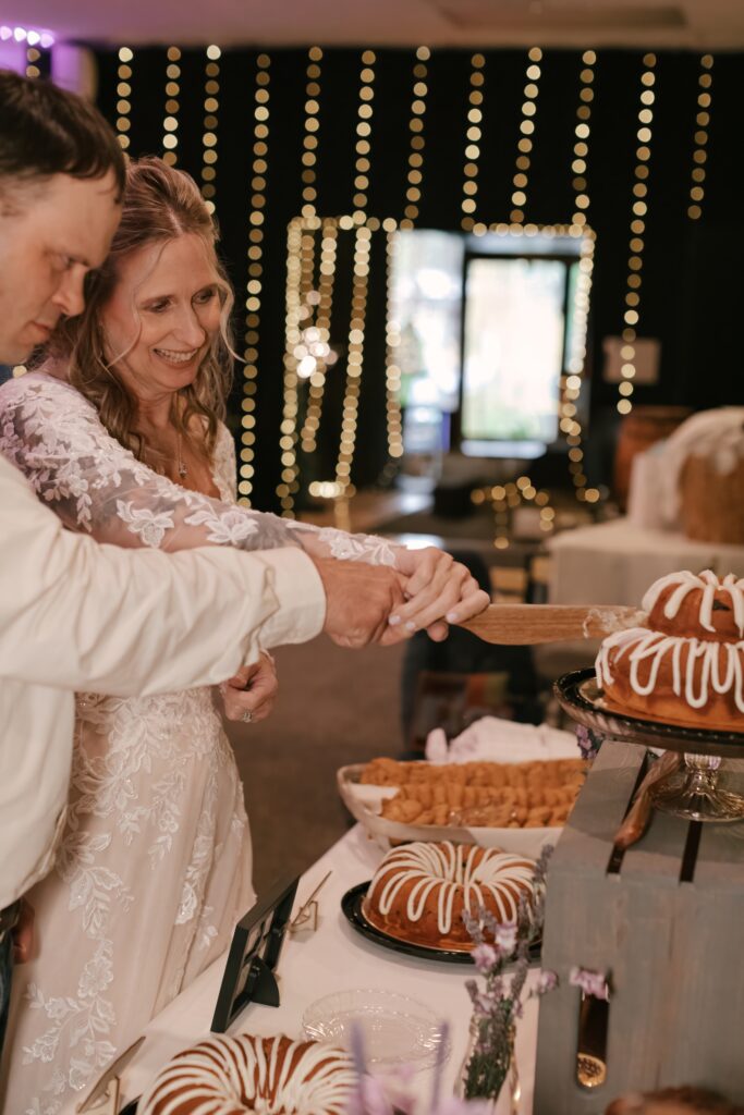 Kasey & John's Cake Cutting at their Wedding Reception at The Grove By The River in Newark, Ohio