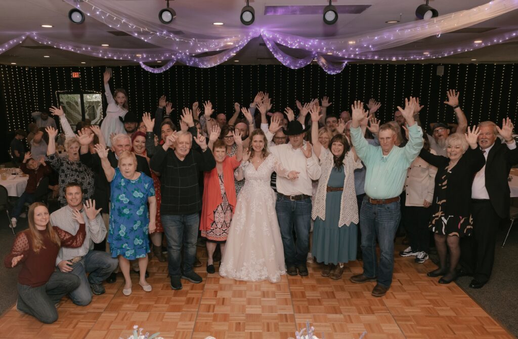 Kasey, John, and their guests on the dance floor for a quick group photo before we opened up the dance floor at The Grove By The River