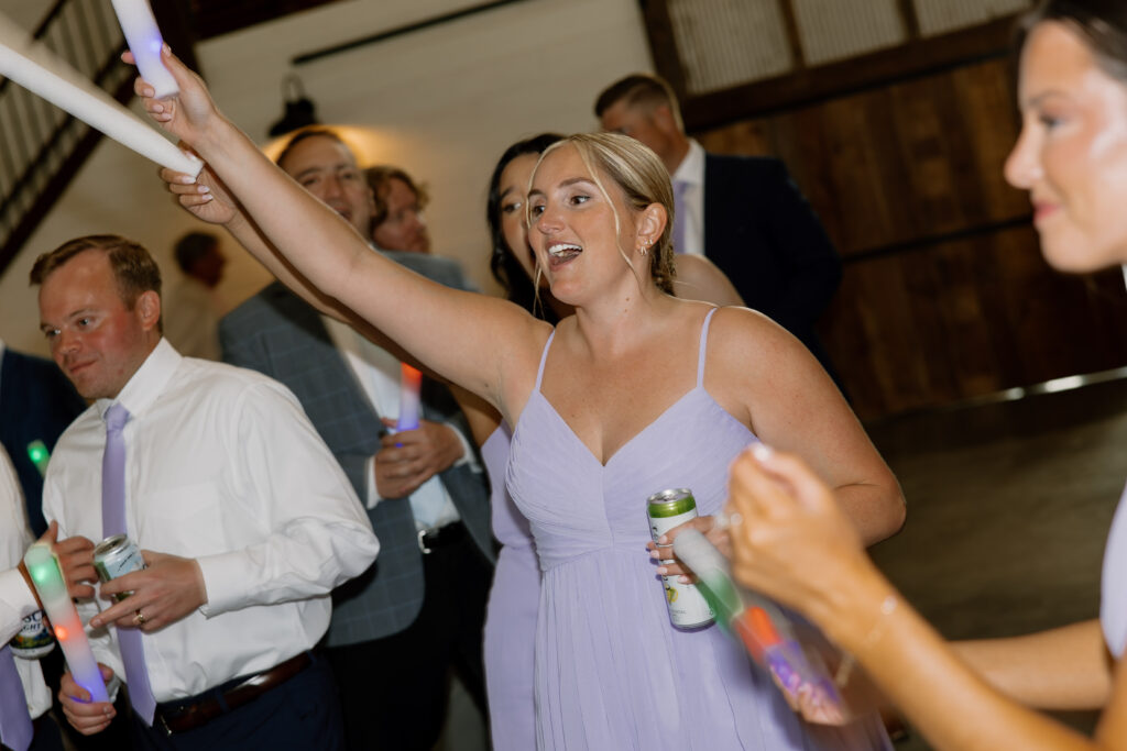 Guests and light sticks on the dance floor at Joe & Allison's Wedding Reception in Pataskala, Ohio