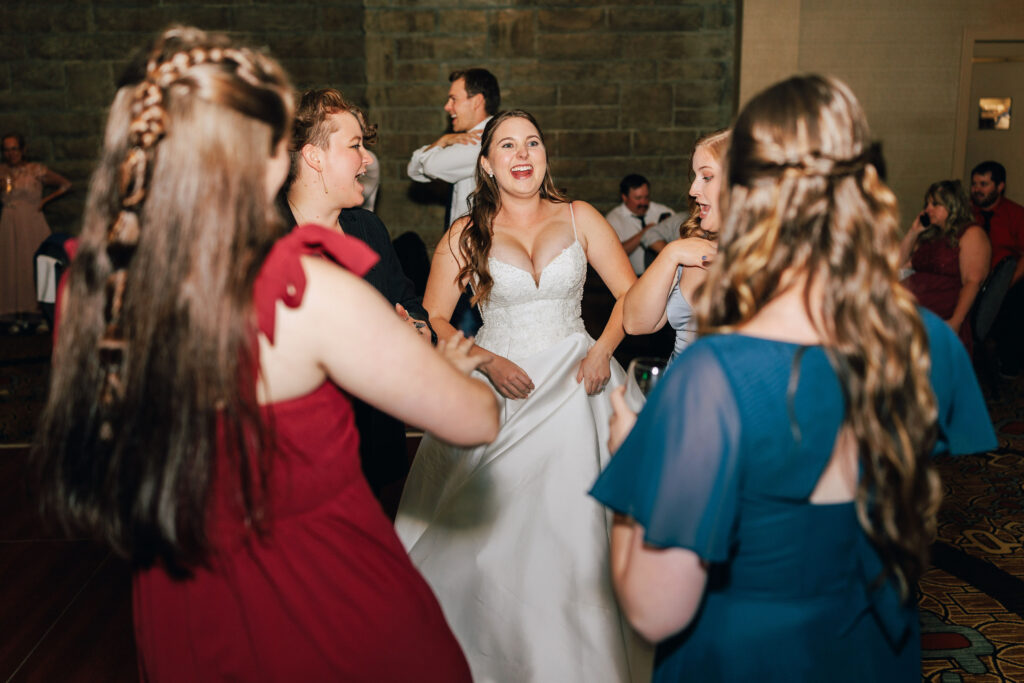 Ann surrounded by her friends on the dance floor at her wedding reception in Granville, Ohio