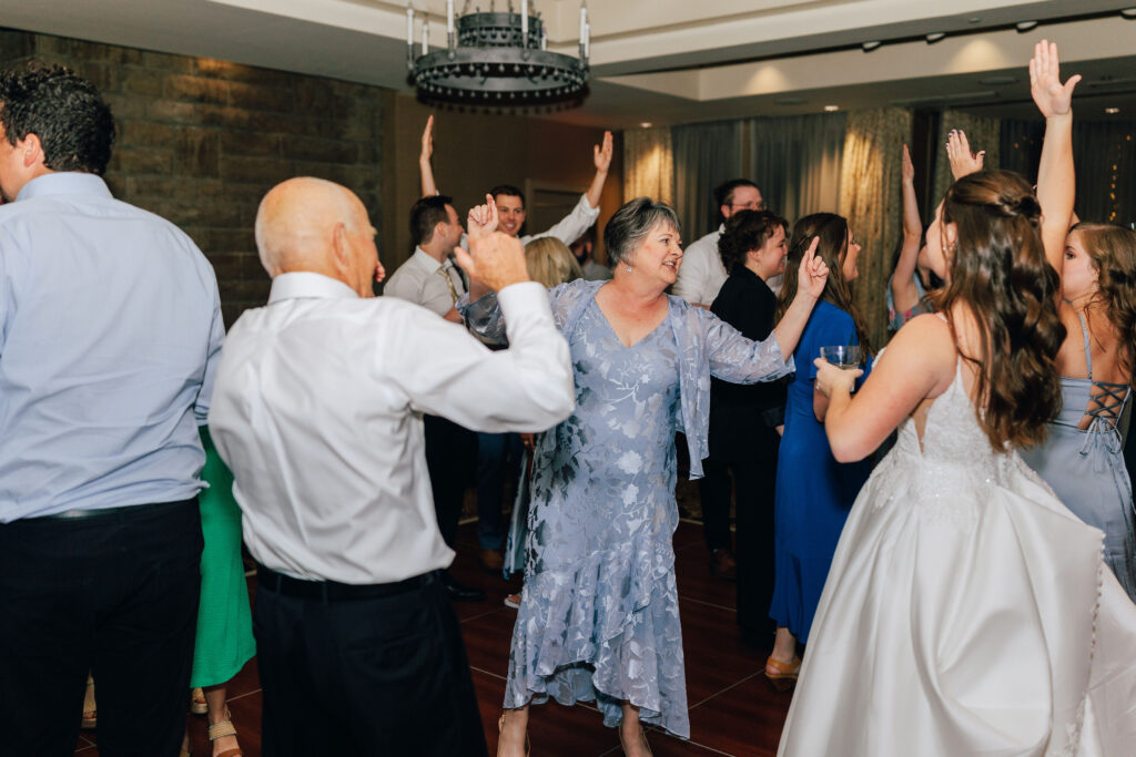 A packed dance floor at Ann & Bryse's Wedding Reception in the Denison Room at Granville Inn