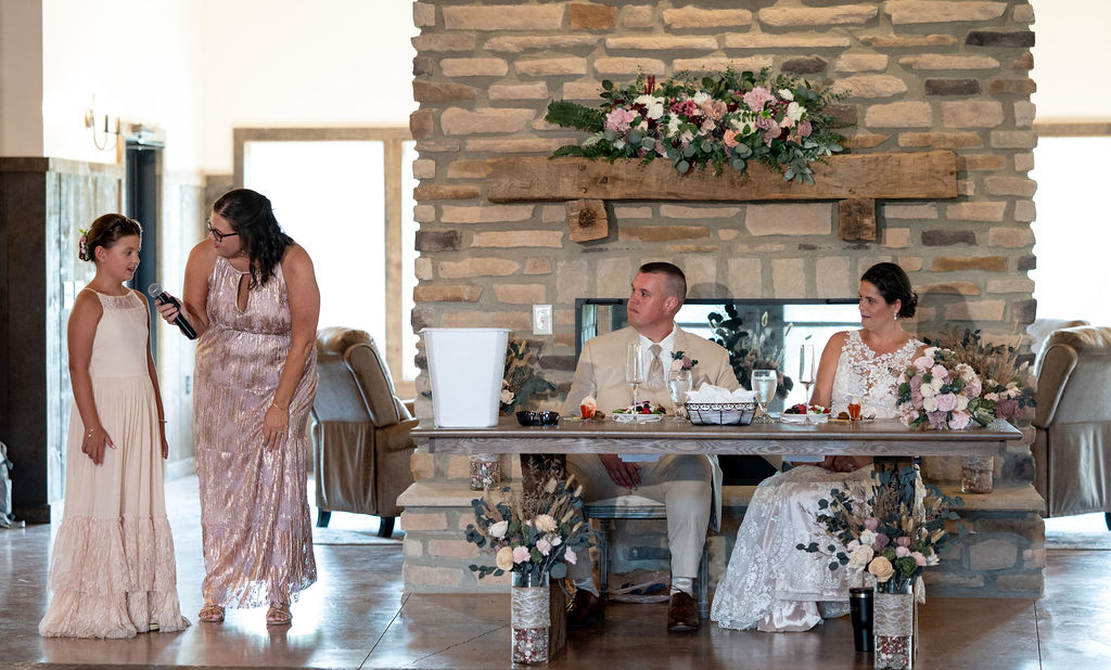 A speech during Sarah & Ryan's Wedding Reception at The Old Barns at Dry Run Farms in Williamsport, Ohio