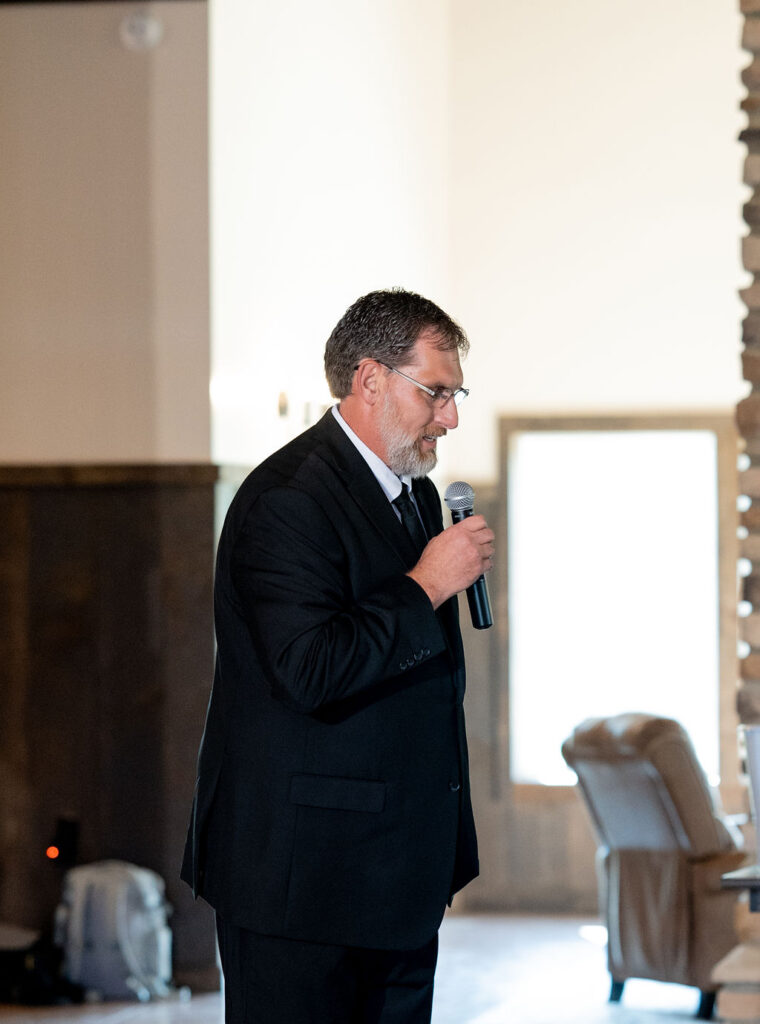 The Blessing before dinner at Sarah & Ryan's Wedding Reception at The Old Barns at Dry Run Farms in Williamsport, Ohio