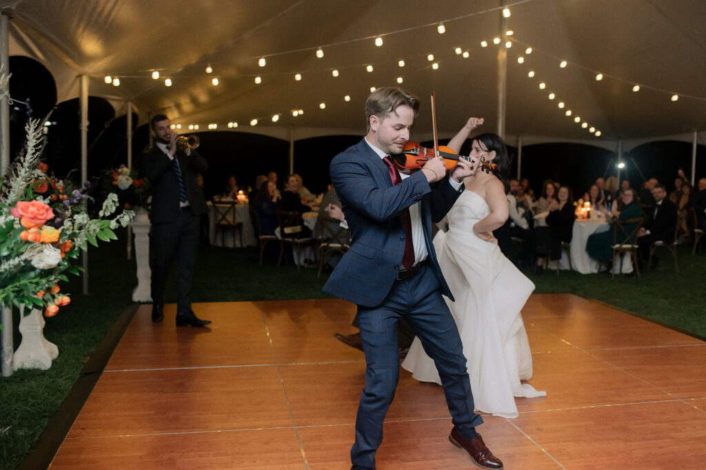 Carly's family joins in for the Bride/Father dance at Bryn Du Mansion