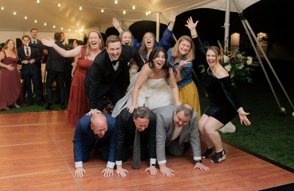 The pyramid formation as part of the Table Dash at Carly & Roy's Wedding