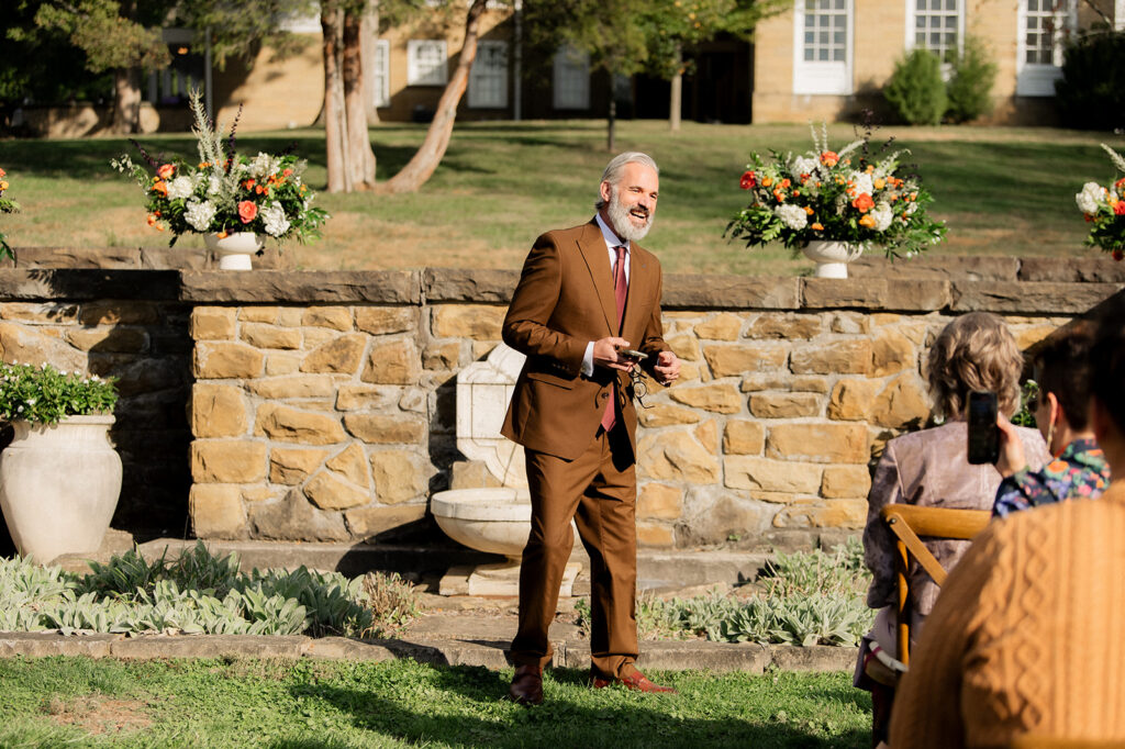 Carly's Dad shares a brief order of events before the wedding ceremony begins at Bryn Du Mansion
