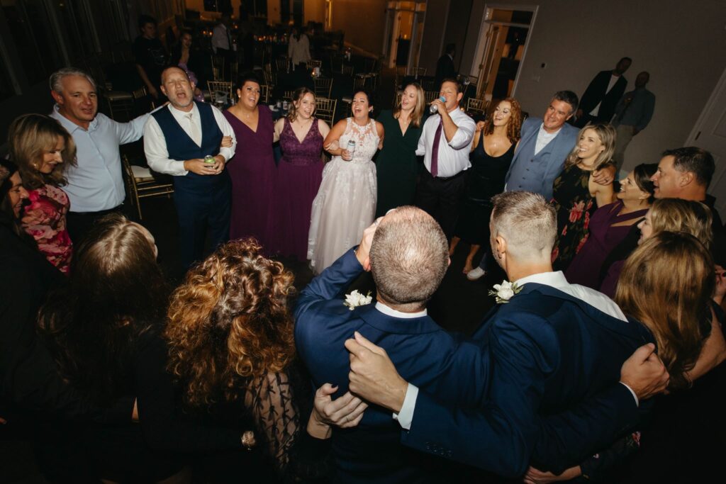 Everyone gathered around in a circle for the last dance at Heidi & Rusty's Wedding Reception at The Wenbeck Wedding & Events Center