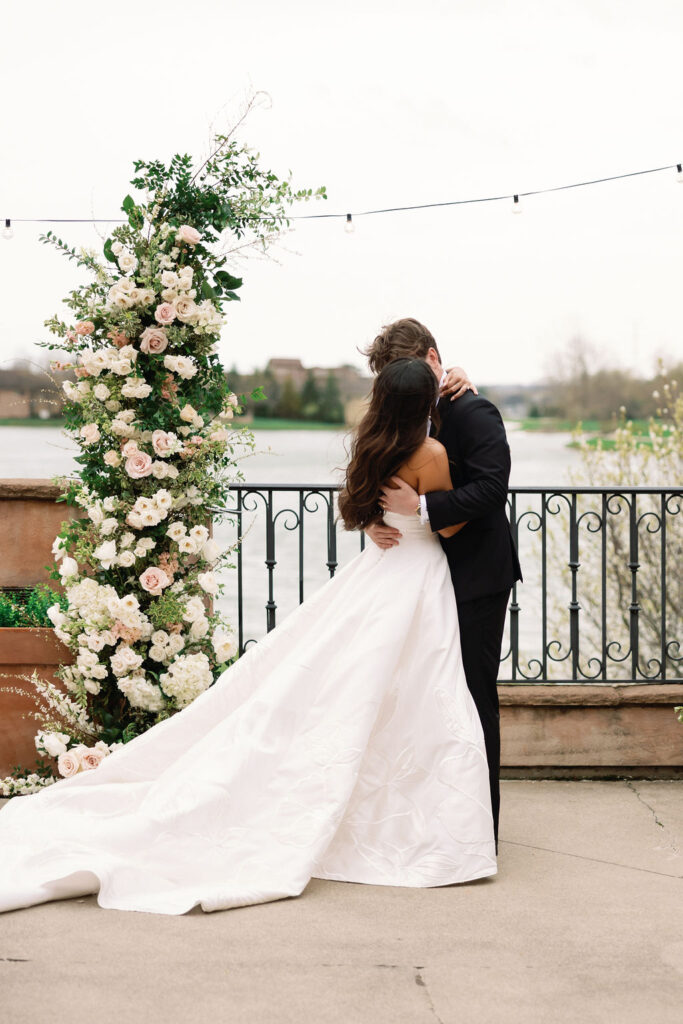 Shannon and Brady seal their wedding vows with a kiss at the Club at Corazon in Dublin, Ohio