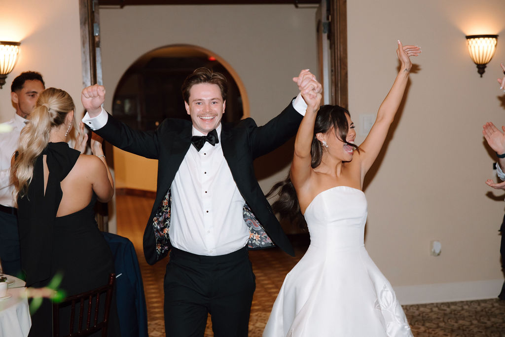 Shannon & Brady enter the ballroom at their wedding reception at the Club at Corazon