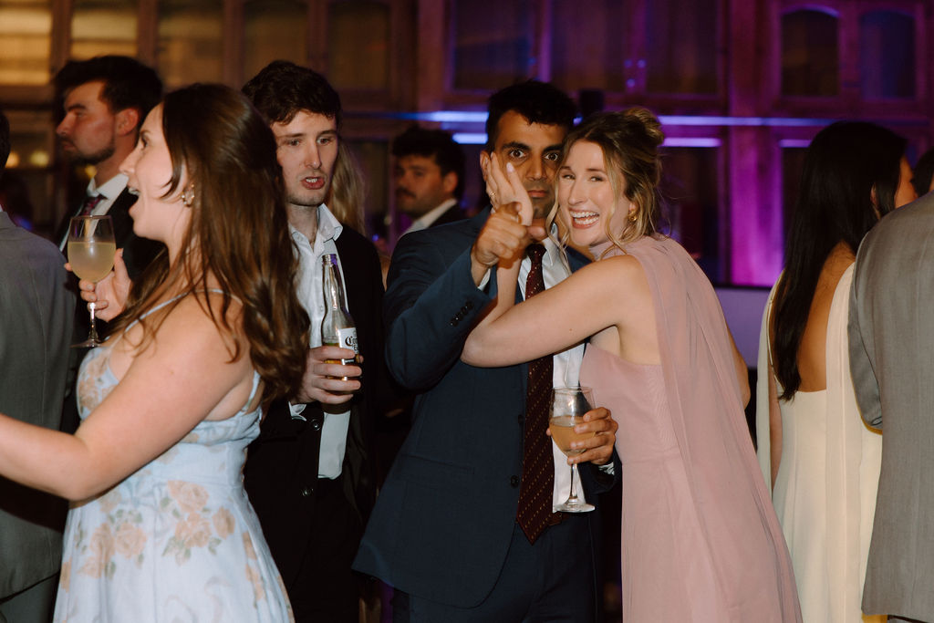 Shannon & Brady's guests on the dance floor at their wedding reception at The Club at Corazon in Dublin, Ohio