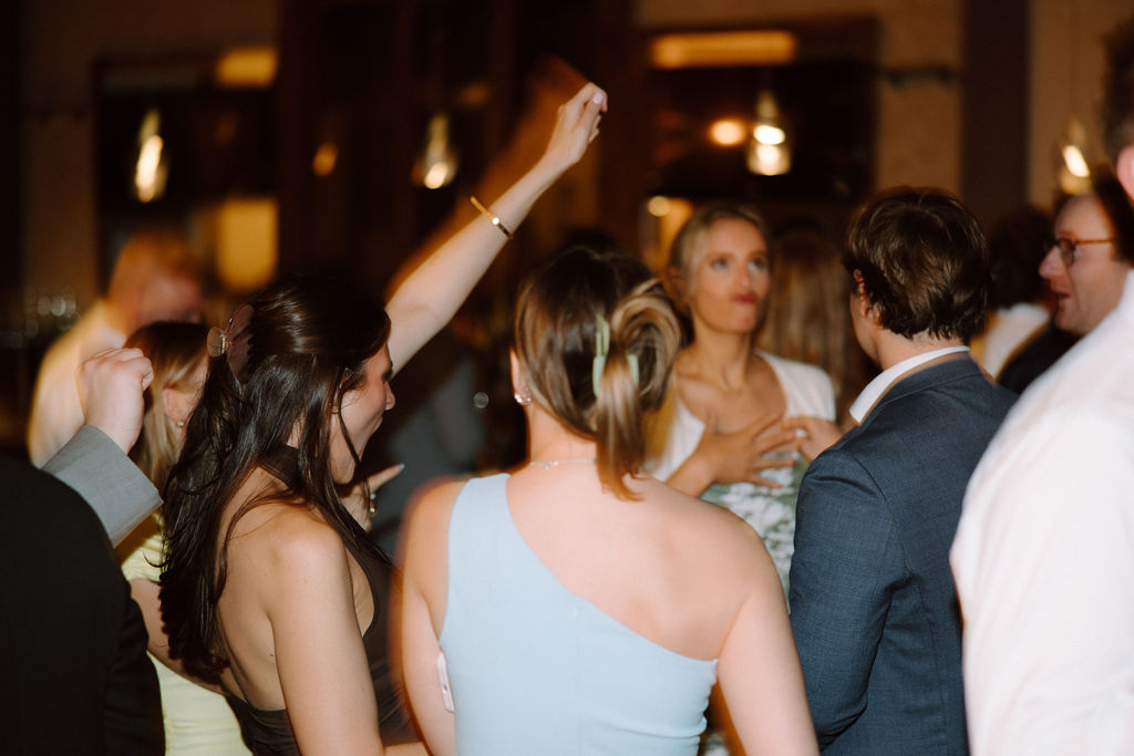 Shannon & Brady's guests having a good time on the dance floor at their wedding reception at The Club at Corazon