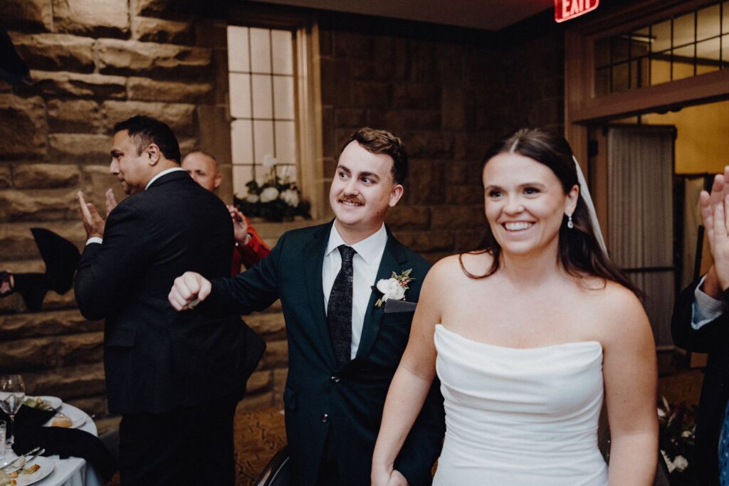 Morgan & Jonny enter their wedding reception at Granville Inn in Granville, Ohio