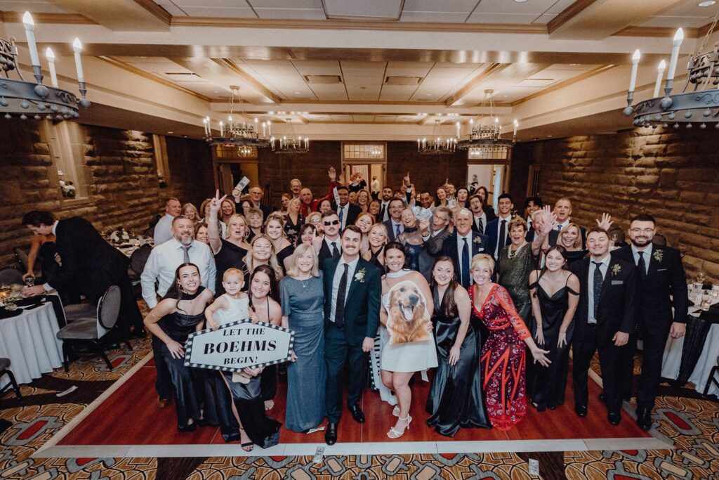 Morgan & Jonny surrounded by their guests for a quick group picture inside the Denison Room at Granville Inn in Granville, Ohio